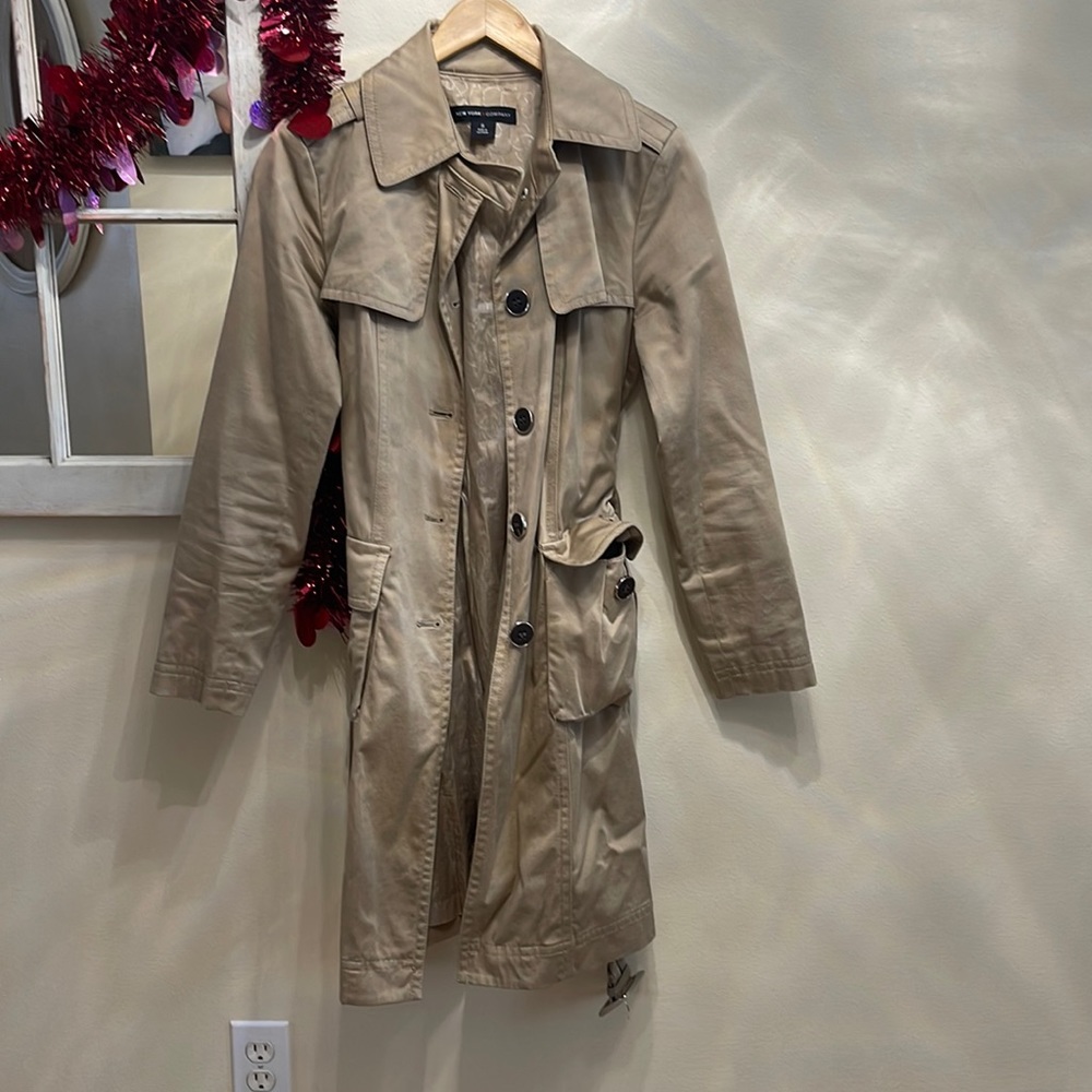 Tan trenchcoat. Non-smoking home
